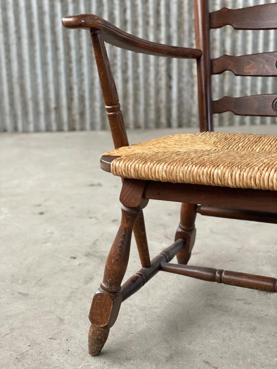 Vintage oak and cane elbow chair ladderback, 1950s