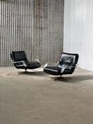 Pair space age black leather and plexiglass swivel chairs 1970s