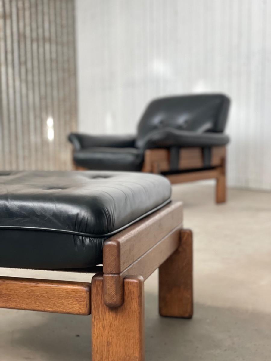 Set Brutalist oak armchairs in Black leather with ottoman, 1960