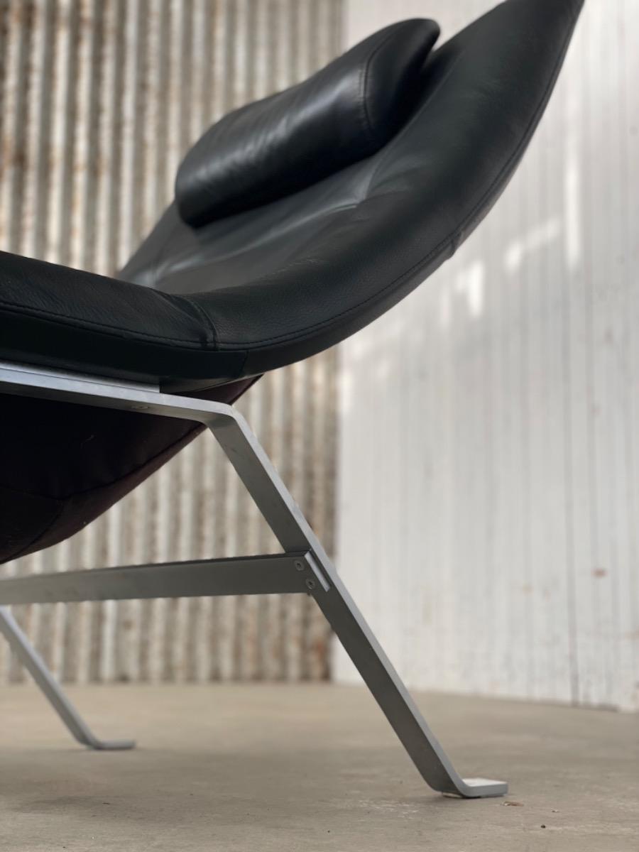 Vintage Black leather Scandinavian loungechair with ottoman, 1980s