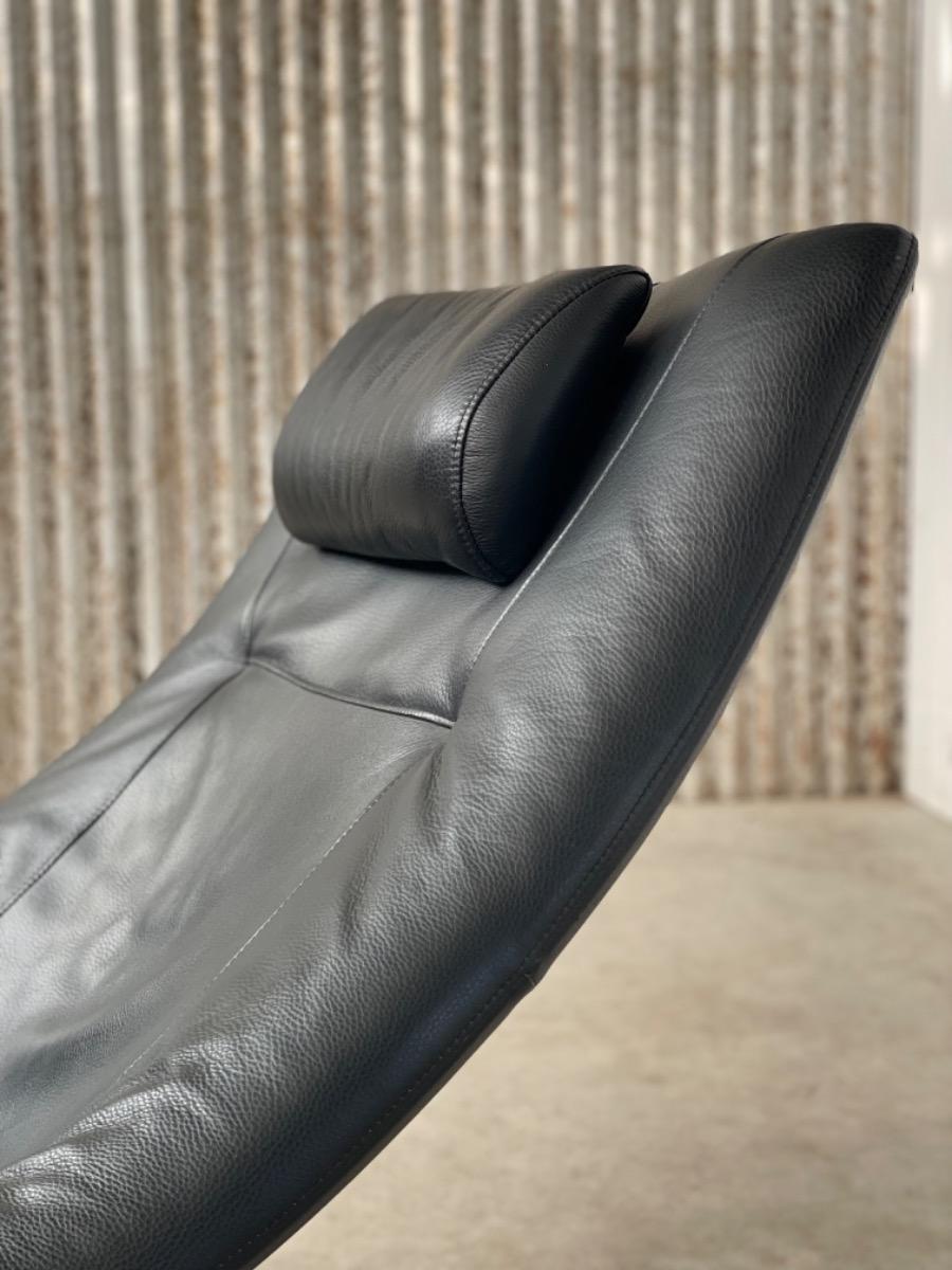 Vintage Black leather Scandinavian loungechair with ottoman, 1980s